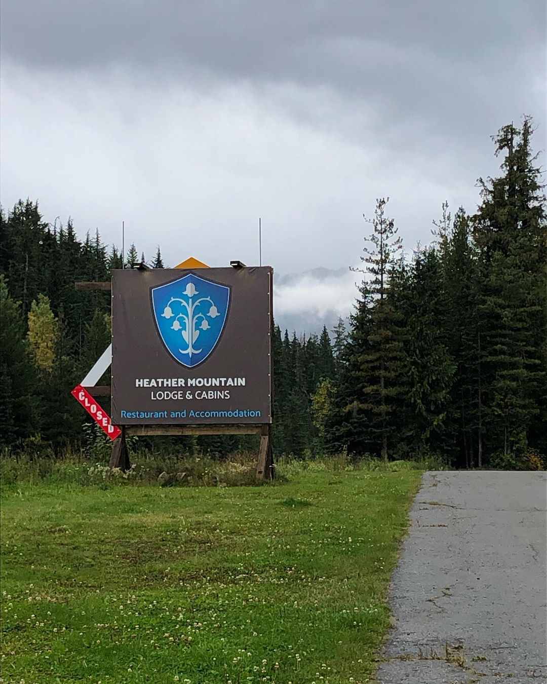The Heather Mountain Lodge sign with a