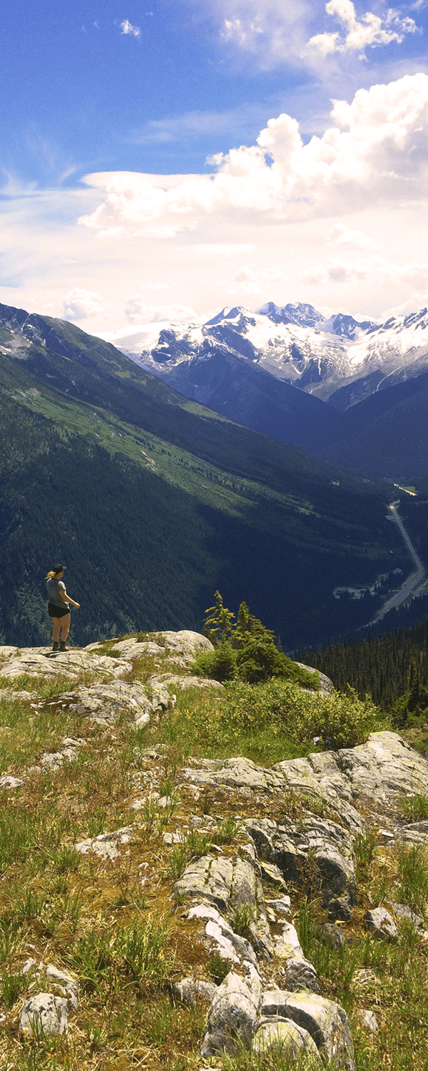 Woman hiking in GNP, BC