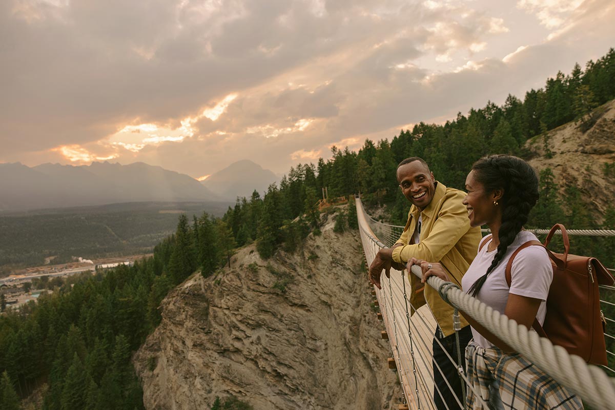 couple enjoying the view from the golden sky bridge